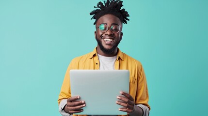 Wall Mural - Young confident fun IT man of African American ethnicity he wear shirt casual clothes hold closed laptop pc computer hold use work on laptop pc computer isolated on plain pastel light blue background.