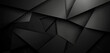 Sleek black geometric shapes on a dark, textured background.