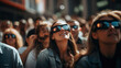 crowd of different people gathers in special sunglasses,looks at the solar eclipse and laughs,unique natural phenomenon