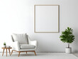 © tanjidvect - Living room with chair and blank white frame mockup on the wall