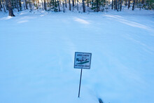 Signage In The Snow On A Golf Course