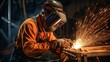 © Anastasiia Havelia - Worker steel. Welder at work. A male welder working at the factory. A man in a protective mask working in production. Factory worker. Industrial production. Metallurgy