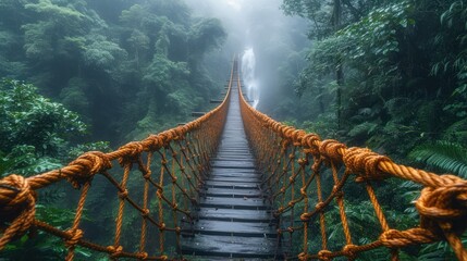 Poster -  a rope bridge in the middle of a jungle with a waterfall in the back ground and fog in the air.