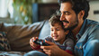 Smiling man and a young boy are enjoying playing a video game together on a couch in a cozy living room.