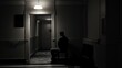 Depressed person alone in a dark room