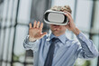 © Katsiaryna - businessman in virtual reality headset in the office
