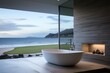  a large white bathtub sitting on top of a bathroom counter next to a window with a view of the ocean.