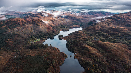 Canvas Print - Drifting over mountain peaks in Loch Trool, Scotland