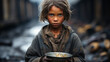 Little homeless, poor child on the street with a plate, hunger, hopelessness
