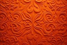  A Close Up Of An Orange Wall With A Pattern Of Swirls And Leaves On The Side Of The Wall.