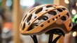 Closeup of an innovative bike helmet made from sustainable materials such as bamboo and recycled plastic.