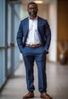 © CraftyImago - African American businessman in formal wear portrait of confident businessman in the modern office.