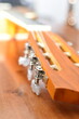 © lisica1 - wooden six-string guitar close-up on a wooden table