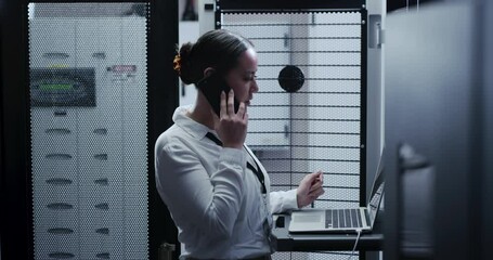 Canvas Print - Server room, woman and laptop with phone call, network and communication with connection, programmer and code. Person, employee and worker with a smartphone, internet and engineer in a workplace