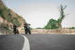 © Odua Images - indonesian motorcyclist traveling on the road with slow speed