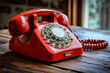 Vintage Red Rotary Dial Telephone on Wooden Table