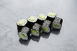 Avocado maki sushi roll with fresh avocado and rice