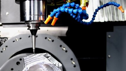 Wall Mural - the 5-axis cnc mills machines for design configuration that utilizes a swivel head machine table and