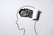 © tadamichi - Mechanism of thinking. Thinking skill and method concept. Gears and human head silhouette.