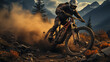 A focused mountain biker fiercely takes on a challenging downhill trail, his bike kicking up a cloud of dust in a rugged mountain setting.
