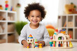 © syhin_stas - Little happy afro american dark skinned child plays with mentensorri toys, wooden educational toys at home or in kindergarten. The concept of education, child development, leisure.