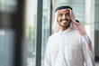 © ink drop - portrait of a middle aged arabian businessman in a modern office building