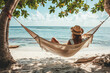 © Elisabeth Cölfen - A woman in a sun hat enjoys a peaceful moment in a hammock, swaying gently by the seaside, with lush green foliage framing the tranquil ocean view