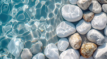 Creative Wallpaper Abstract Image Of White Rounded Smooth Pebble Stone Under Transparent Water With Waves. Backdrop Sea Bottom Pattern Surface. Top View 
