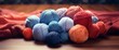 colorful balls of yarn are laying on a table