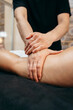 © andrew_shots - Male hands doing anti-cellulite massage