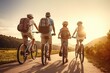 Happy Afro-American family with kids traveling together by bicycle a country road. Active lifestyle for adult and children at nature. Hobby for family, activity pursuit