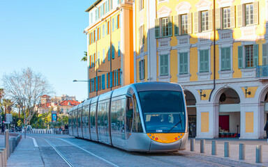 Wall Mural - Tram moving on a street at sunny day - Nice, France