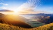 © Lucia - panoramic view of the sunrise in the mountains valley