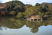 A Temple Garden And Lake In Autumn, Kyoto, Honshu, Japan