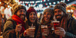 Happy friends having fun drinking mulled wine and hot chocolate at Christmas Market - Cheerful young people enjoying winter holidays on weekend vacation - Tourism lifestyle and friendship concept