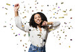 Happy woman with confetti falling everywhere on her isolated transparent PNG, Birthday celebration party or New Year eve celebrating concept