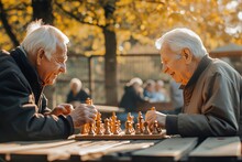 Senior Friends Playing Chess Game At The Park