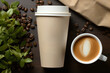 © Aulia - Closeup of white paper cup of coffee on a table with bean coffee