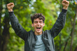 Young man overjoyed with happiness
