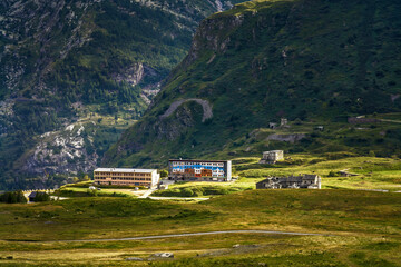 Wall Mural - Abandoned buildings and hamlet on the meadow at Mont Cenis pass in France.