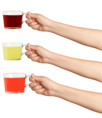 Wall Mural - Women's hands hold. Three cups of green, black and red tea tea in a transparent glass cup. On a blank background