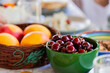 © Austockphoto - fresh shiny cherries in bowl on table at christmas