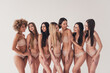 No filter photo of joyful feminist girls with diverse body type support love imperfections isolated pastel color background