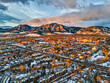 © Aaron - Drone view of University of Colorado, Boulder and the Flatirons at sunrise in the winter snow.