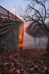 Wall Mural - Old stone arch bridge across the Mississippi river 