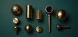  a collection of brass knobs and knobs on a green surface with a white dot on the top of the knob and a black dot on the bottom of the knob.