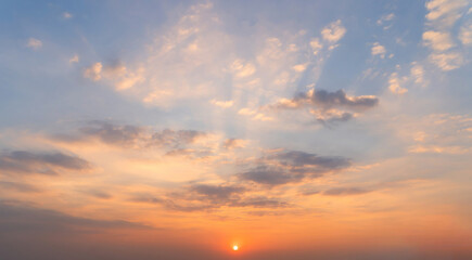 Wall Mural - Sunset sky. Abstract nature background. Dramatic blue with orange colorful clouds in twilight time.