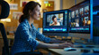 © MYDAYcontent - A woman focused on video editing on double screen setup