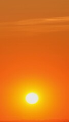 Wall Mural - As the sunrise, the sky transforms into a breathtaking display of majestic clouds, time lapse.