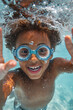 © boyhey - children playing under the pool with goggles summer concept